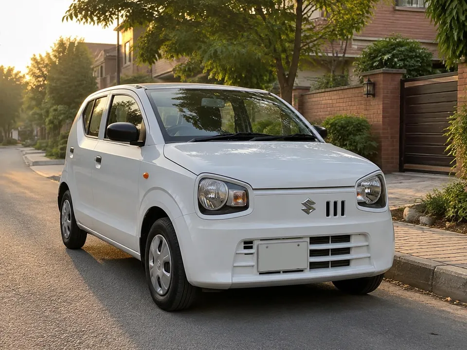 White 2025 Suzuki Alto, the automatic driving school car, parked on a quiet Lahore street